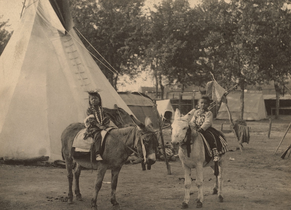 Children riding horses